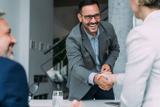 Sales rep closing a deal in person